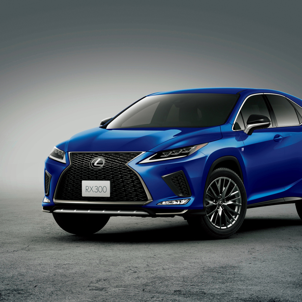 Синий автомобиль Lexus RX 300 F SPORT 2019 года на сером фоне