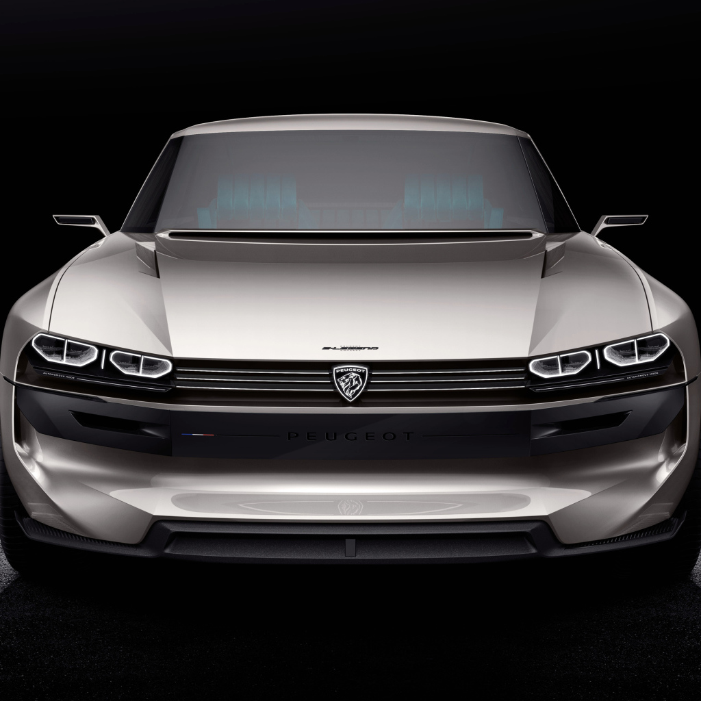 Серебристый автомобиль Peugeot E-Legend Concept на черном фоне