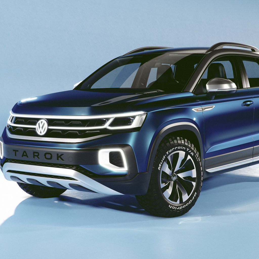 Синий внедорожник Volkswagen Tarok Concept 2019 года на голубом фоне