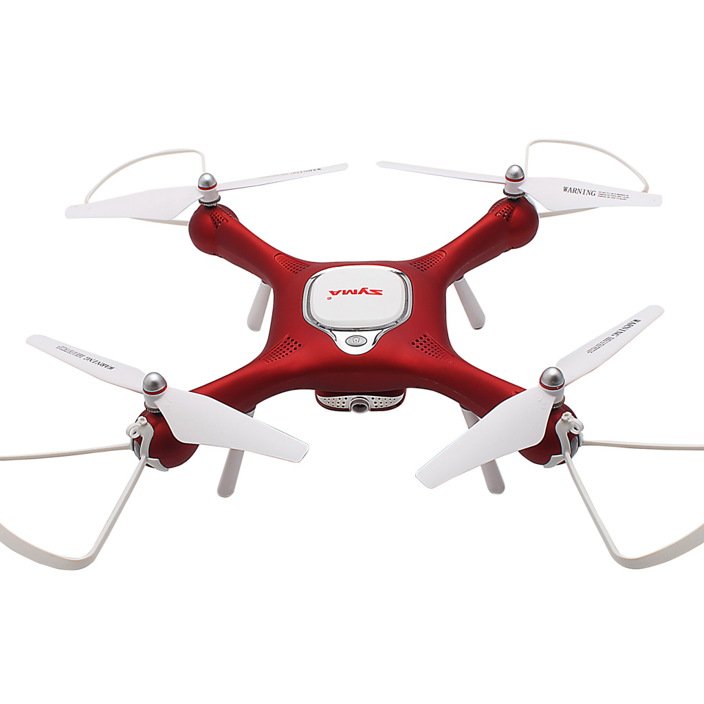 Красный дрон SYMA X25W на белом фоне
