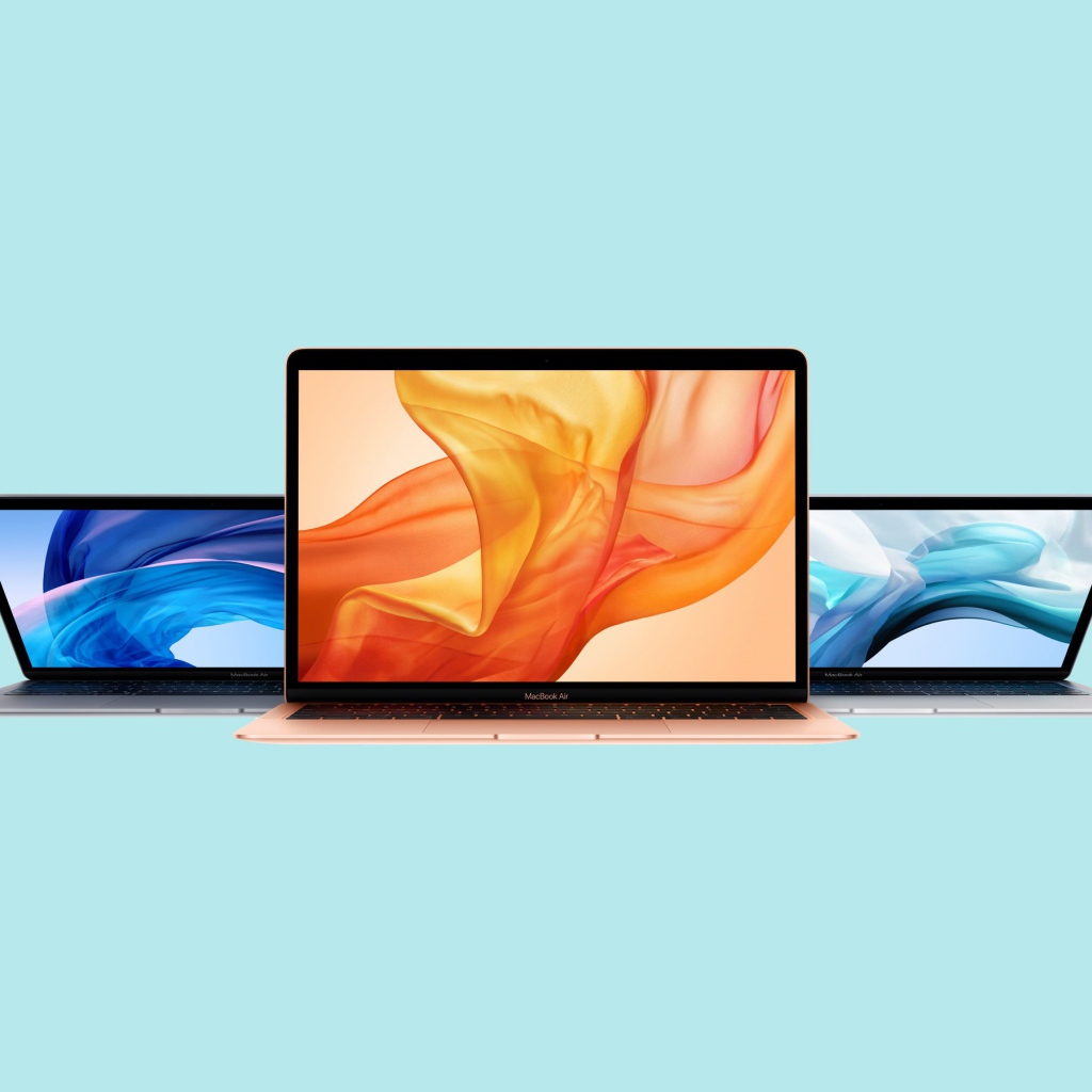 Тонкие макбуки MacBook Air на голубом фоне