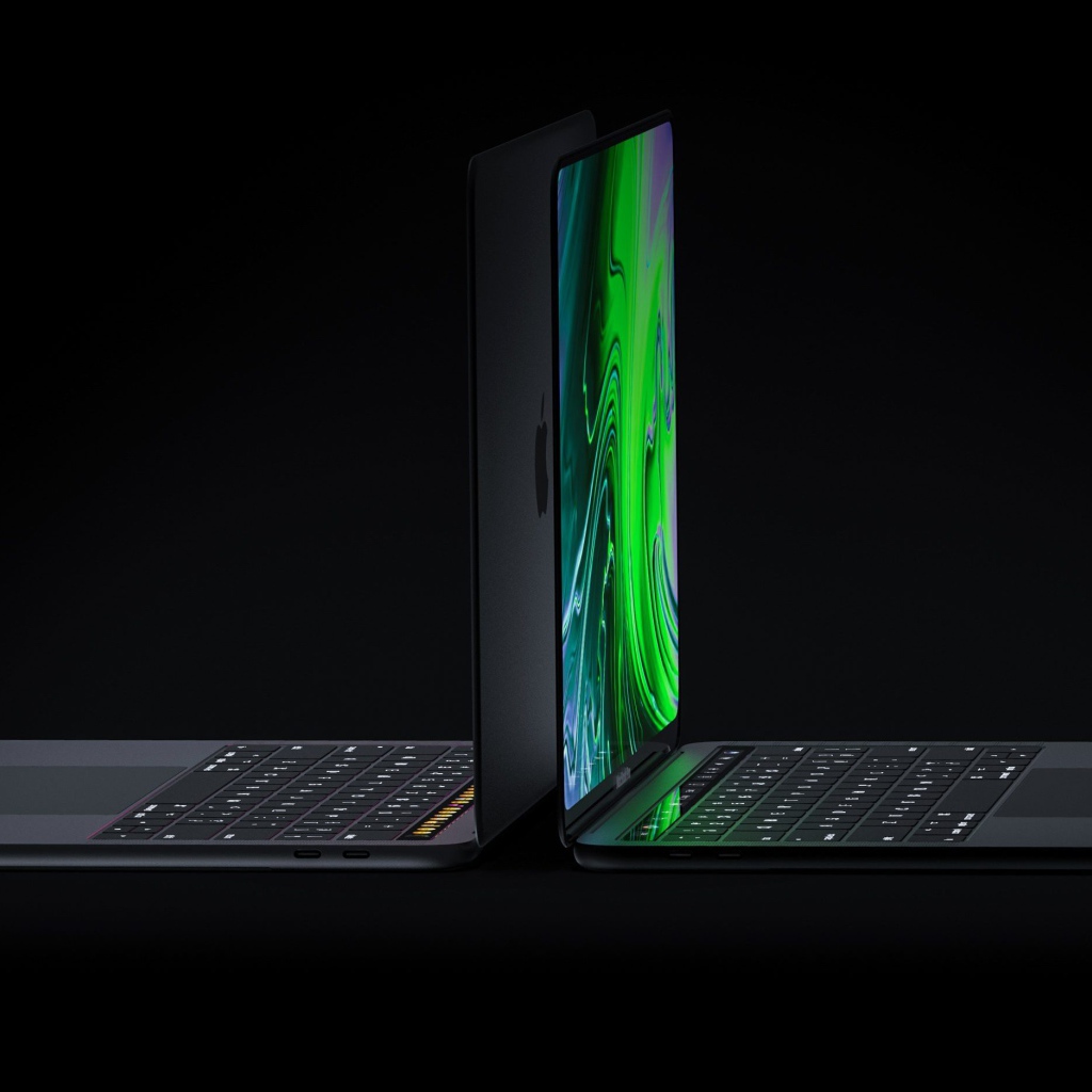Two 2019 Apple New MacBook Pros on a Black Background