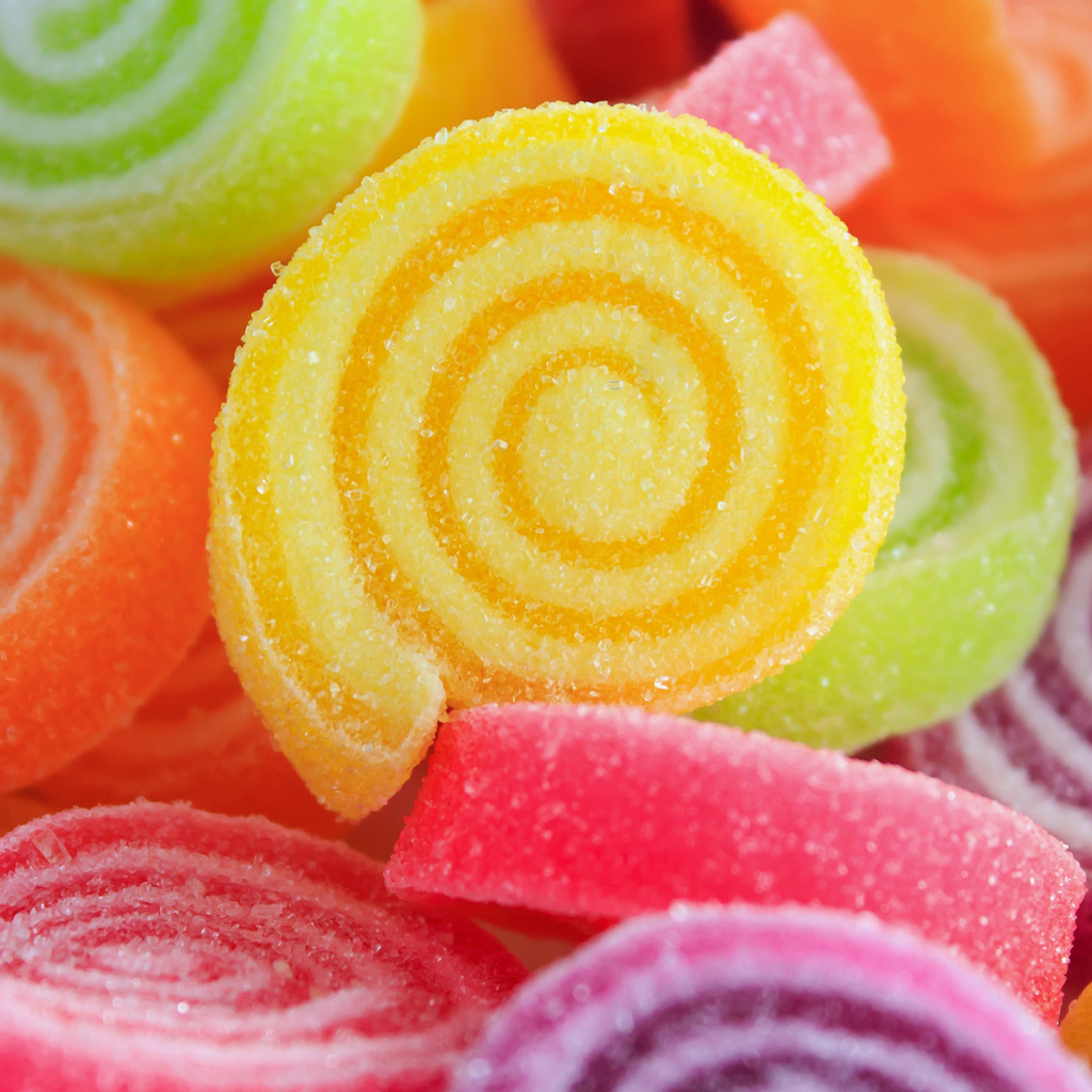 Разноцветный  сладкий мармелад в сахаре крупным планом