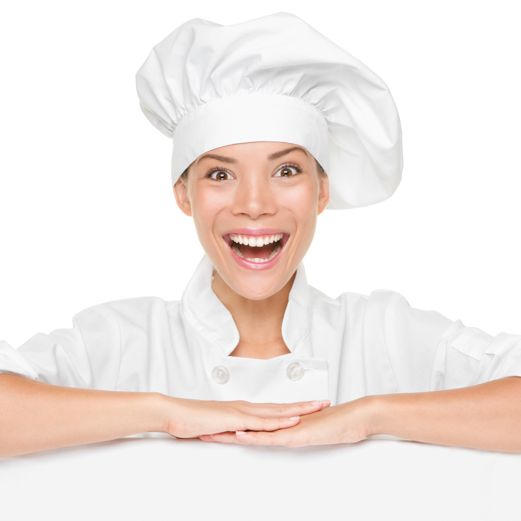 Улыбающаяся девушка повар на белом фоне