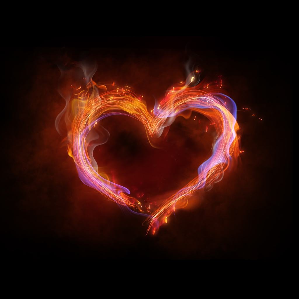 Огненное неоновое сердце на черном фоне