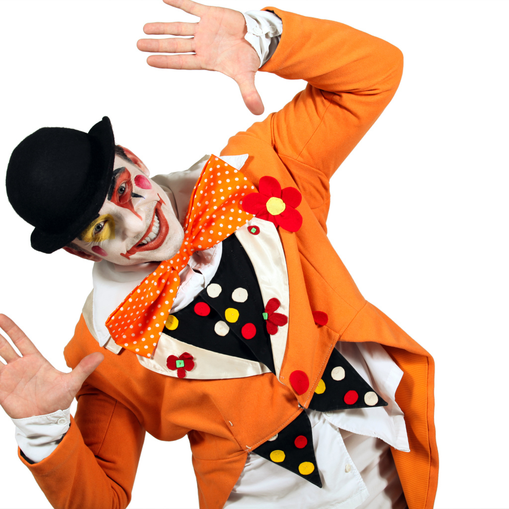 Smiling male clown on white background