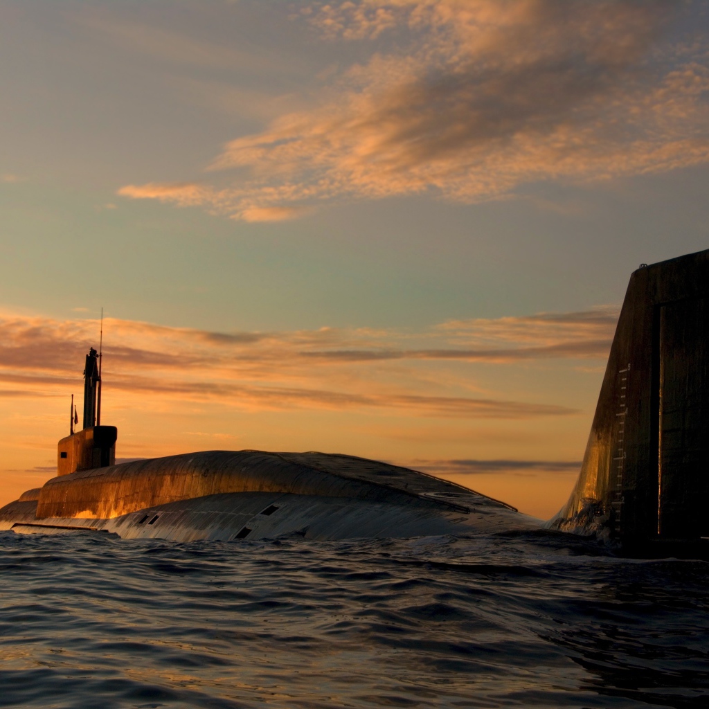 Large submarine in the sea under a beautiful sky