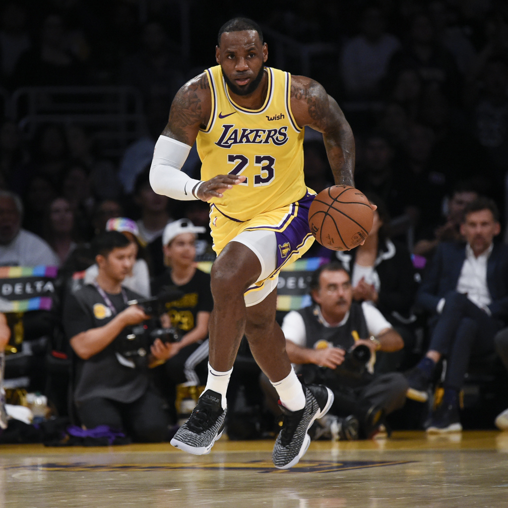 Basketball player LeBron James on the field with the ball