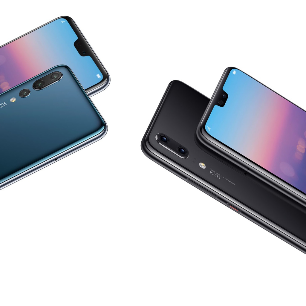 Красивые тонкие смартфоны Huawei P20 Pro на белом фоне