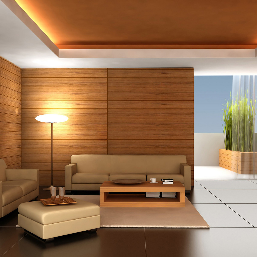 Большая комната с деревянными стенами и кожаными диванами