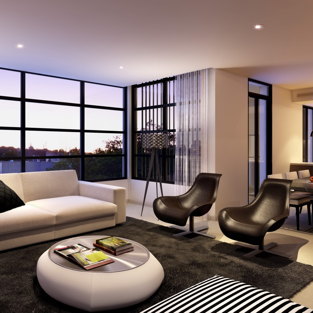 Диван, два кожаных кресла и стол в гостиной с большим окном 