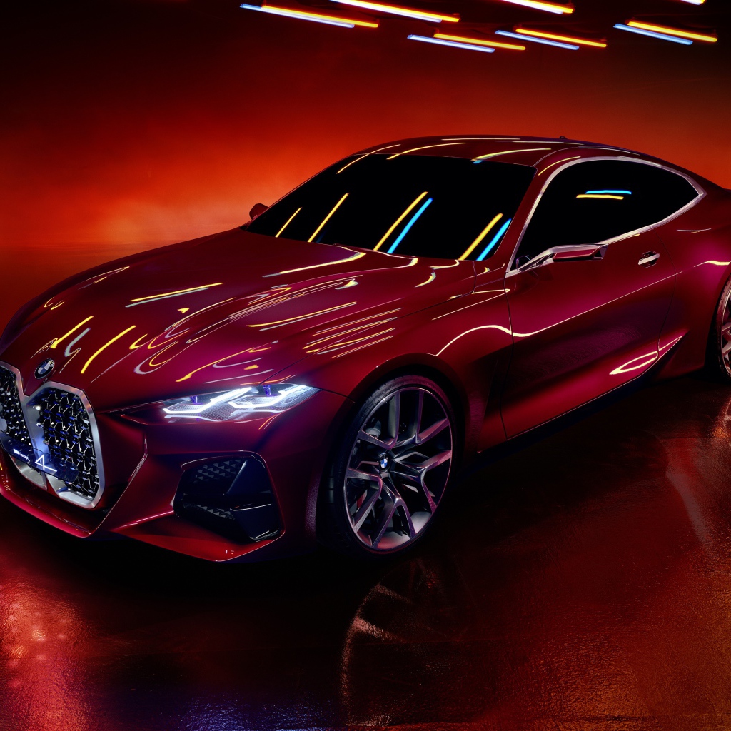 Красный автомобиль BMW Concept 4 2019 года на красном фоне