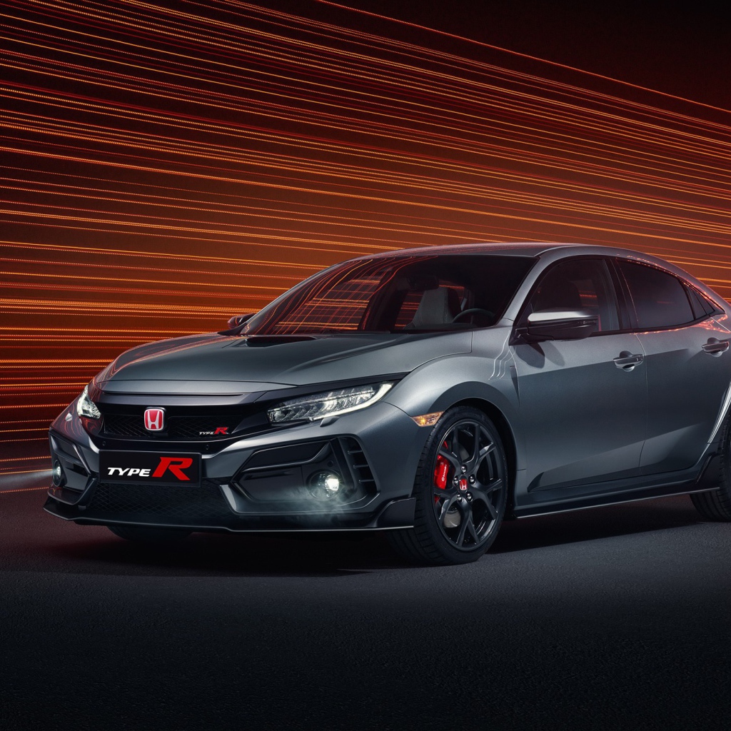 Серебристый автомобиль Honda Civic Type R Sport Line 2020 года на фоне лучей 