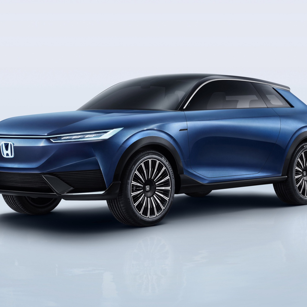 Синий автомобиль Honda SUV Econcept 2020 года на сером фоне