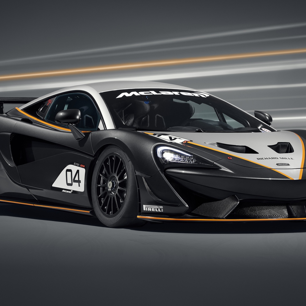Спортивный автомобиль McLaren 570S GT4 2020 года на сером фоне