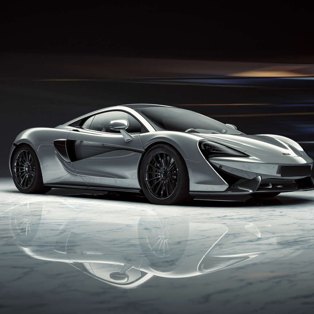 Серый спортивный автомобиль McLaren 520S 