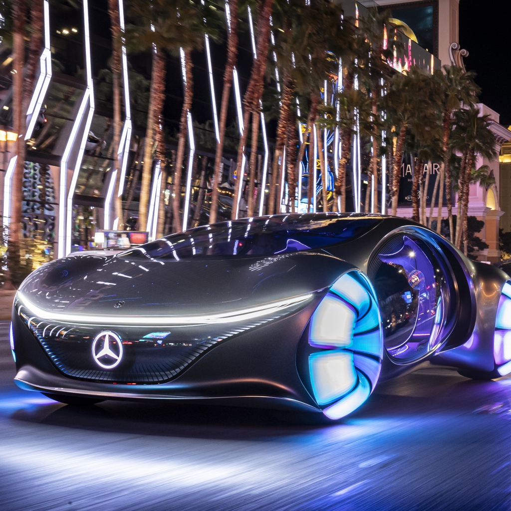 Автомобиль Mercedes-Benz VISION AVTR, 2020 года с неоновыми колесами на улице