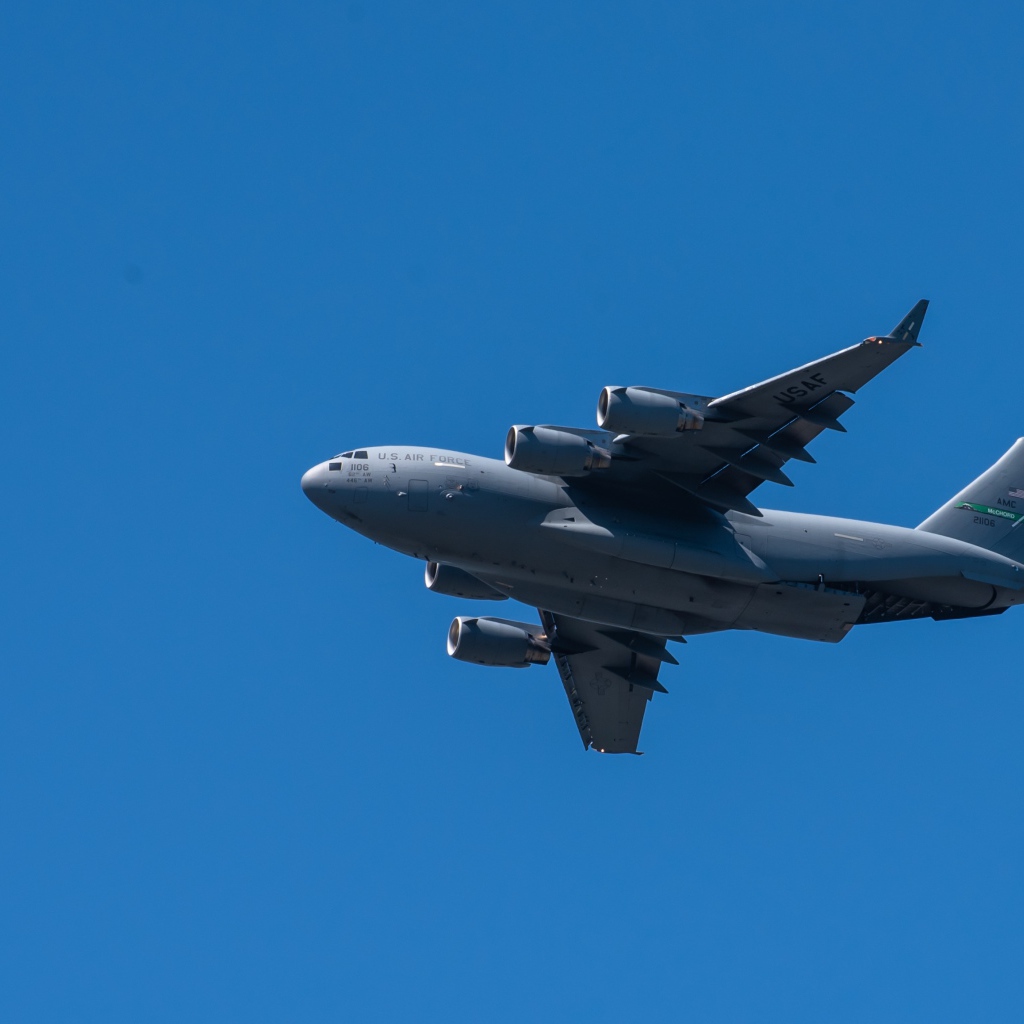 Big Boeing C-17 Globemaster III in the blue sky