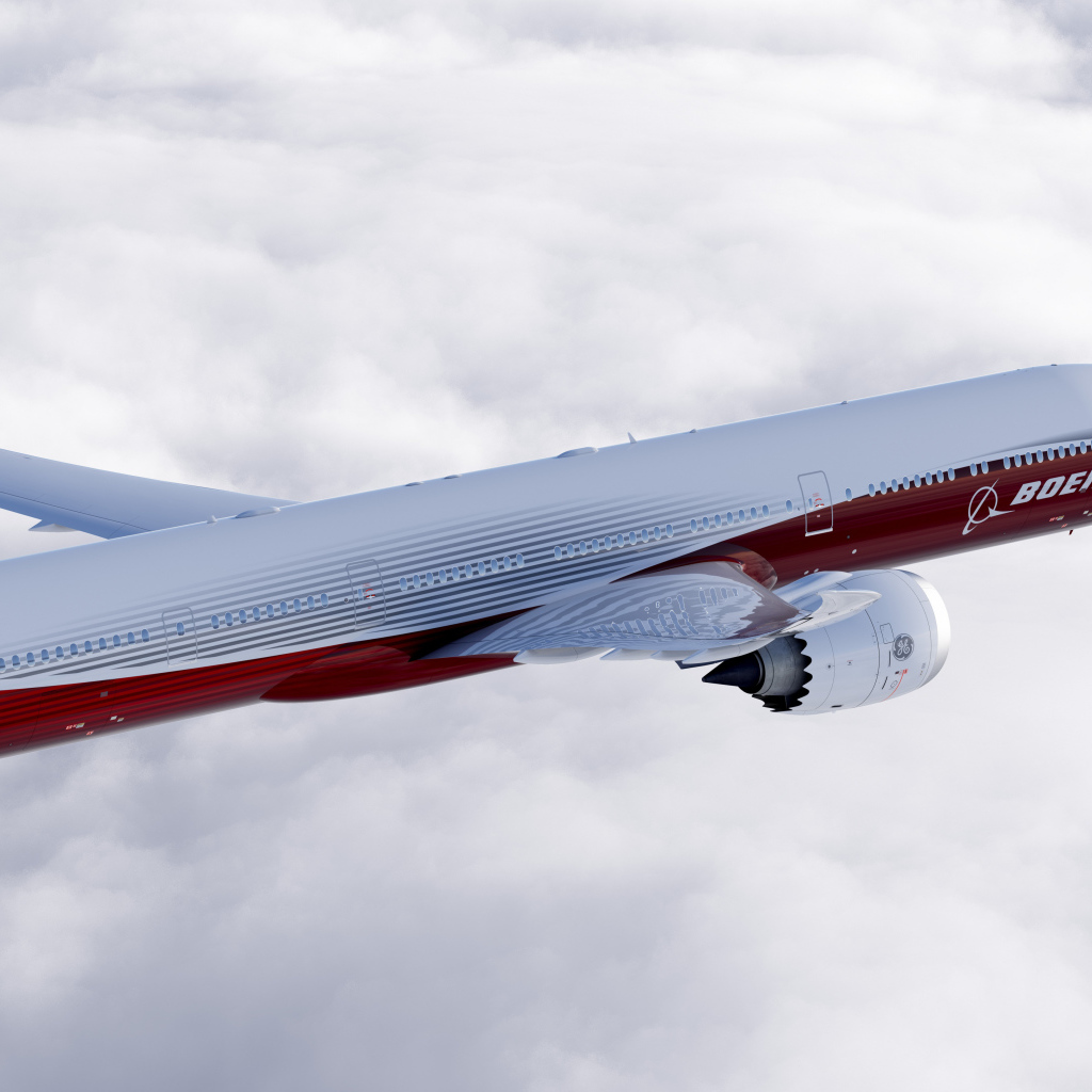 Большой пассажирский boeing 777 в небе 