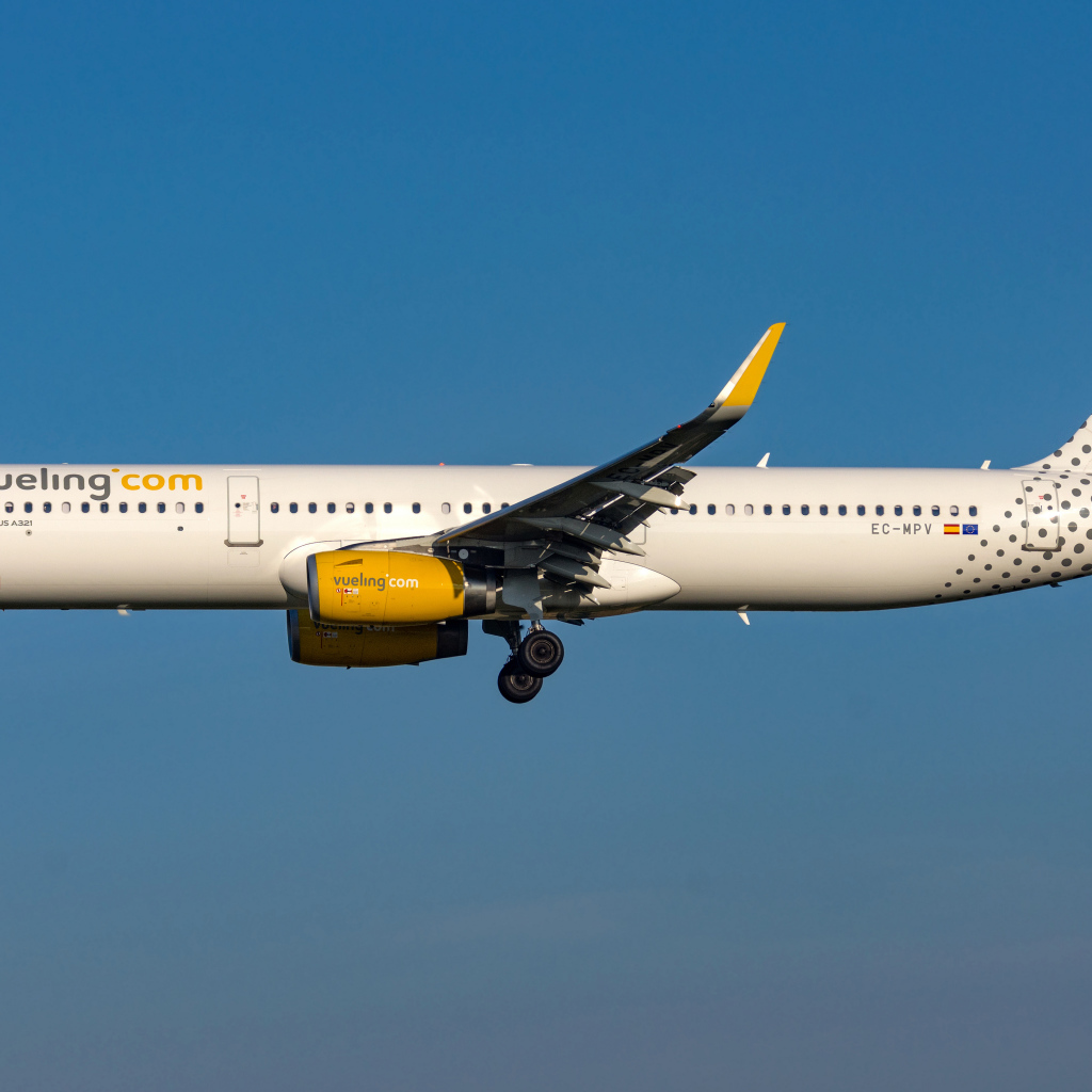 Passenger Airbus A321-200S of Vueling Airlines in the sky