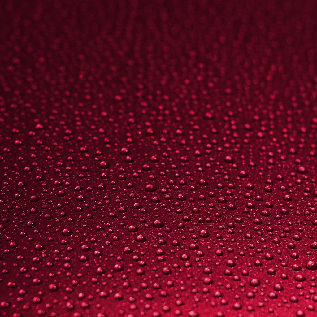 Красный фон с каплями воды 