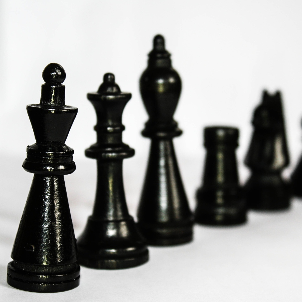 Black wooden chess on the table