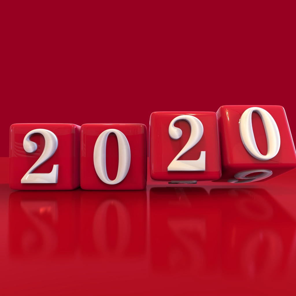 Cubes with white numbers 2020 on a red background