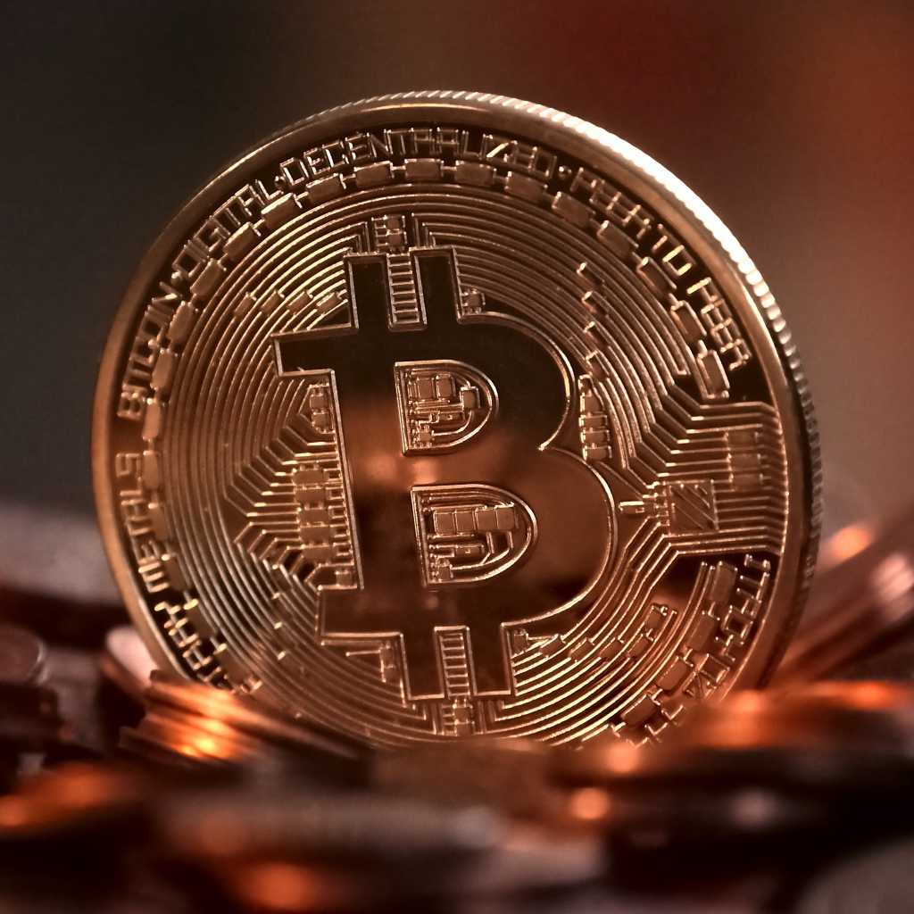 Gold expensive bitcoin coin close up