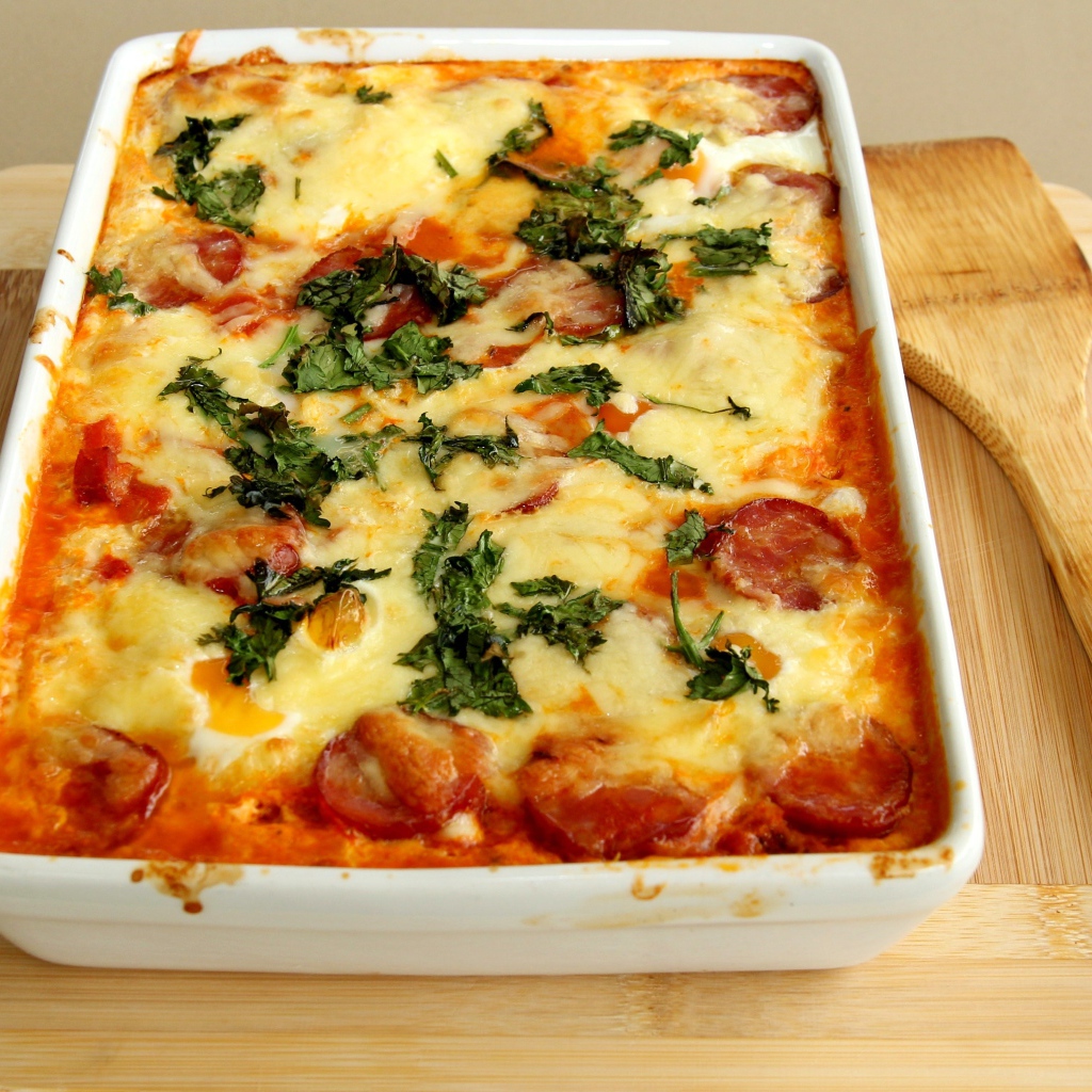 Casserole with sausage and cheese on the table