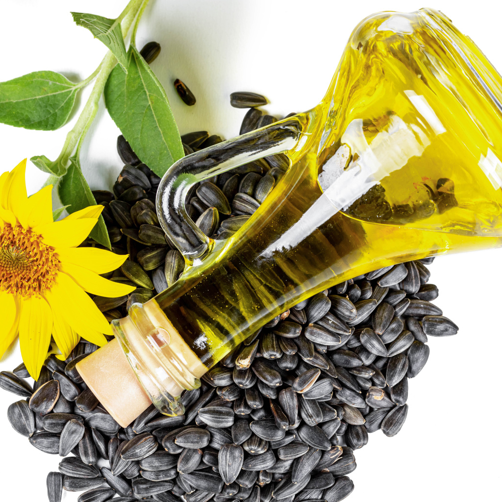 Подсолнечное масло с семечками и цветком