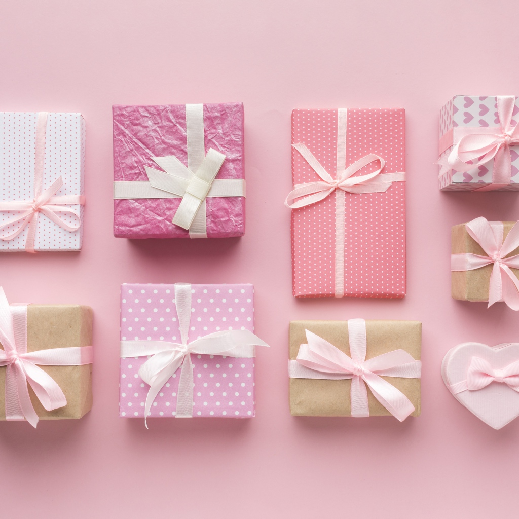 A lot of gifts on a pink background