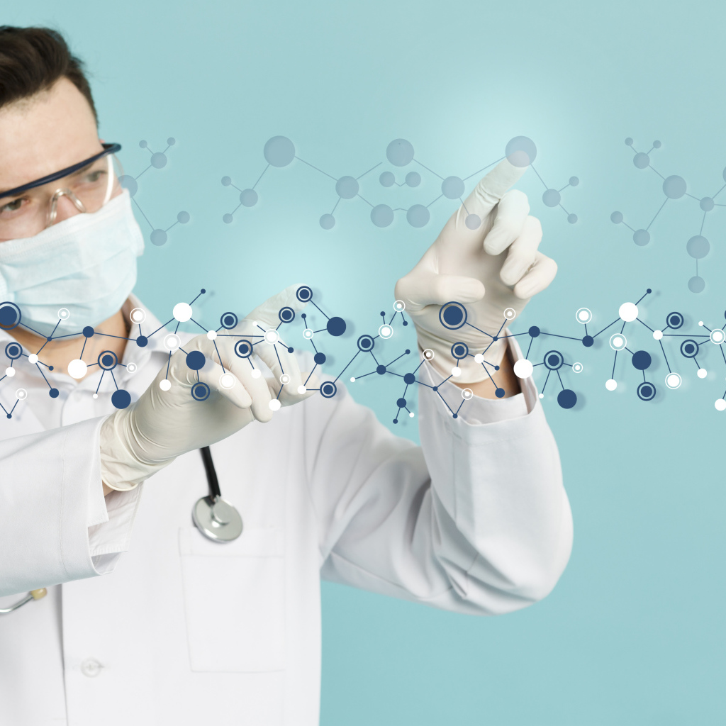 Male doctor examines molecules on a blue background