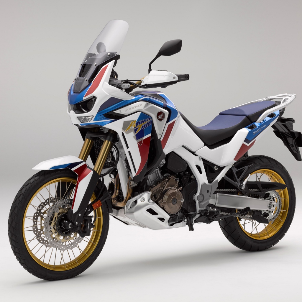 Спортивный мотоцикл Honda  CRF 1000 D, 2020  года на сером фоне