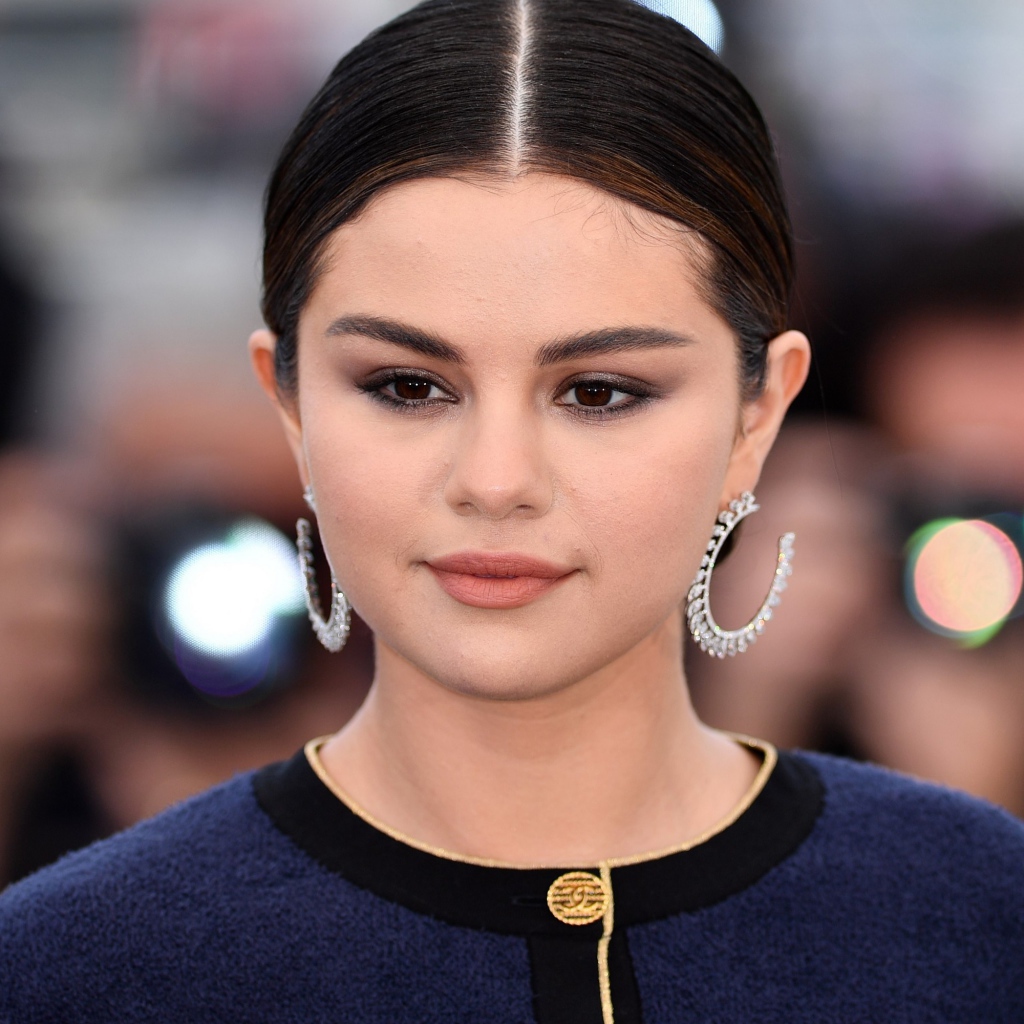 Singer Selena Gomez in big earrings