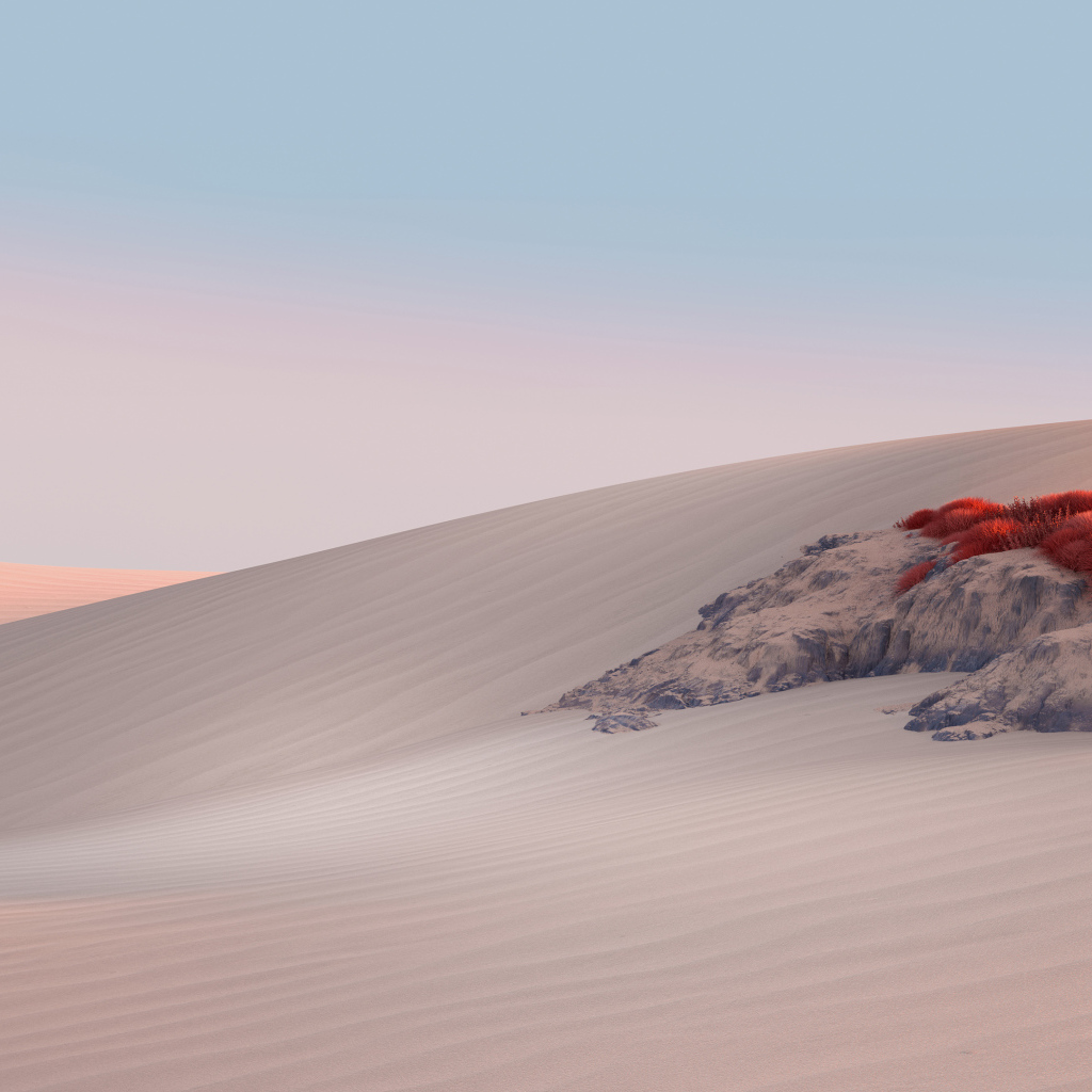 Пустыня с желтым песком на фоне голубого 