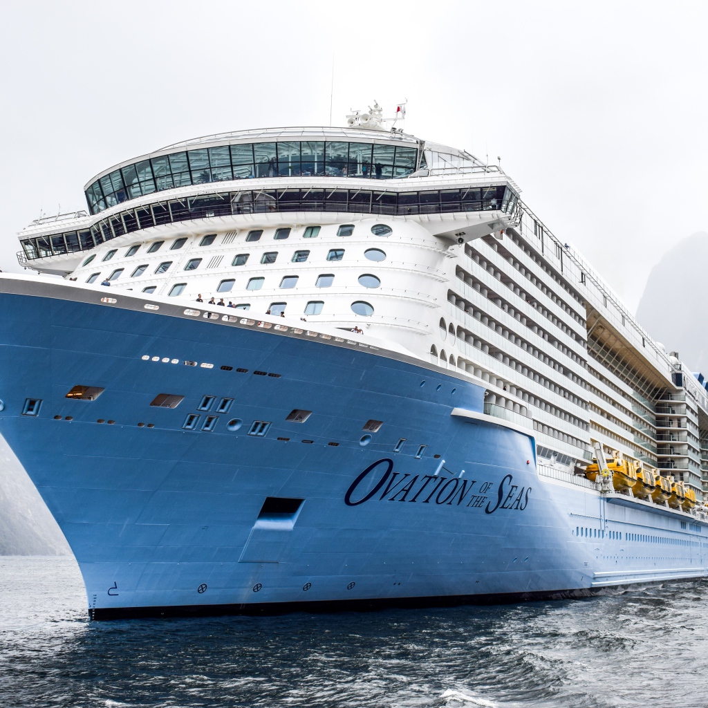 Large cruise ship Ovation of the Seas sails into the fjord