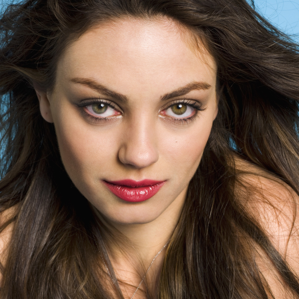 Brown-eyed American actress Mila Kunis face close up