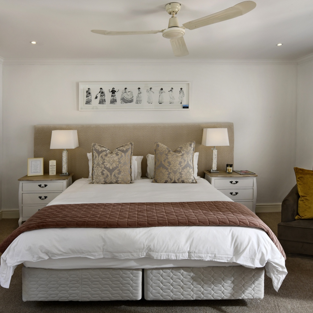 Large bed in the bedroom with fan