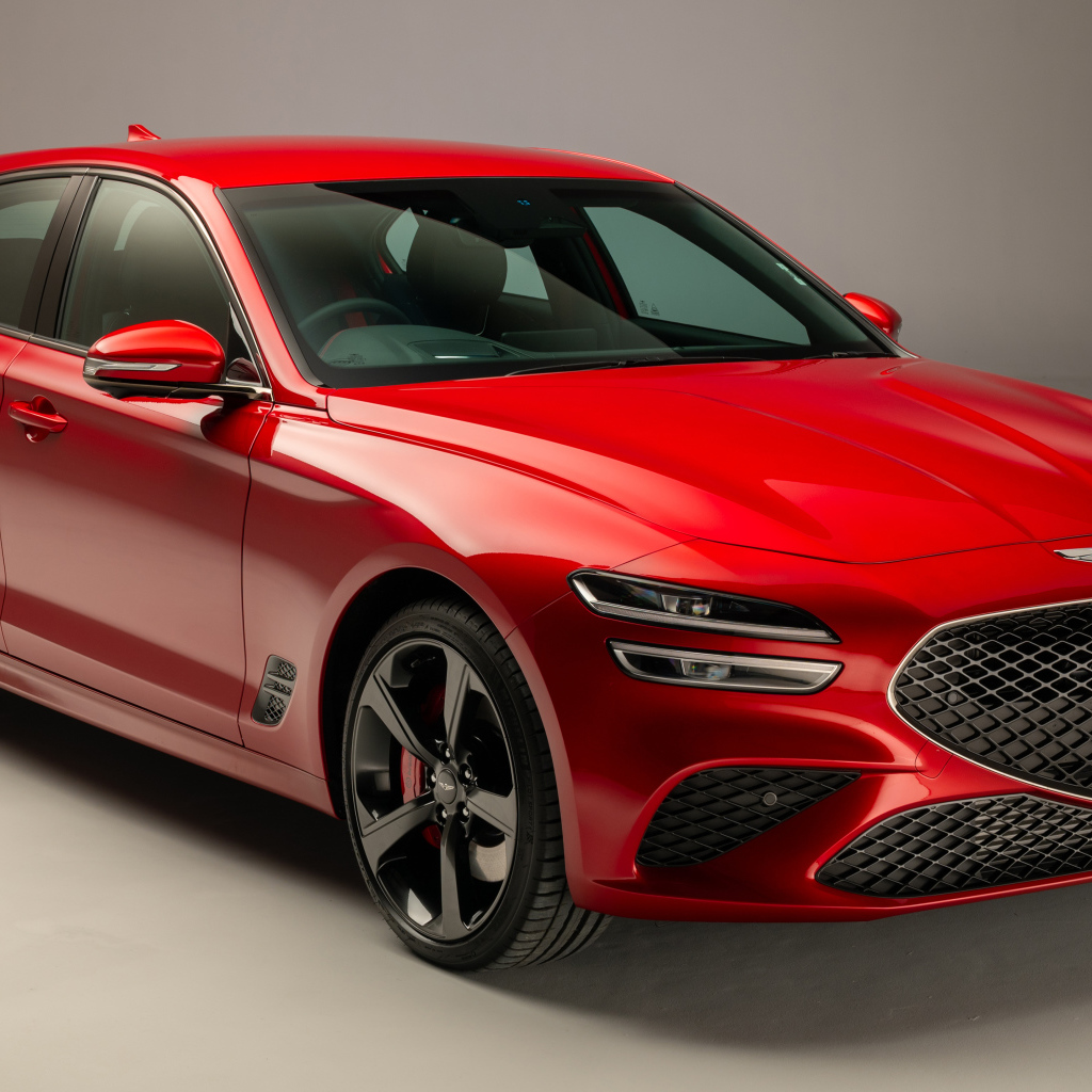 Красный Genesis G70 2.0T Shooting Brake 2021 года на сером фоне