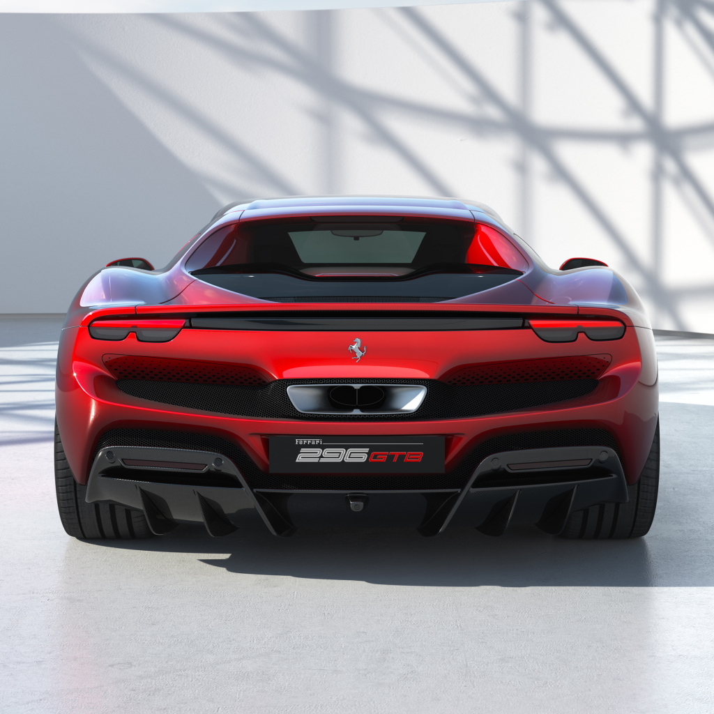 Красный Ferrari 296 GTB 2022 года вид сзади