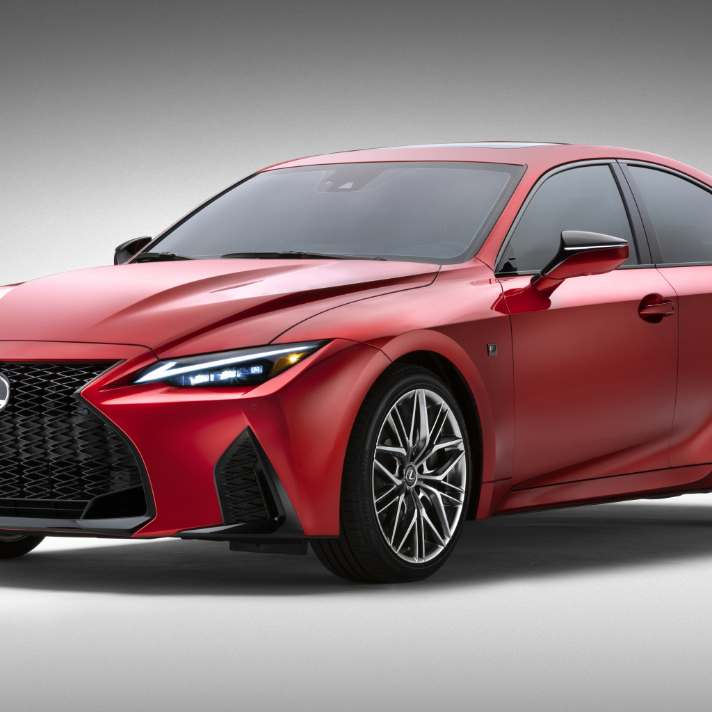 Красный Lexus IS 500 F SPORT Performance, 2022 года на сером фоне