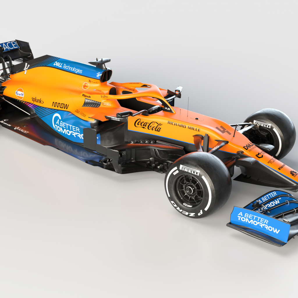 Быстрый гоночный автомобиль McLaren MCL35M 2021 года на сером фоне