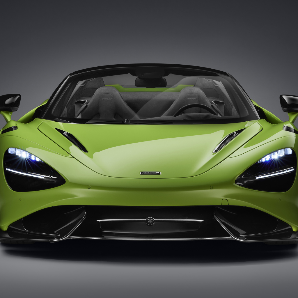 Зеленый McLaren 765LT Spider 2022 года а сером фоне 