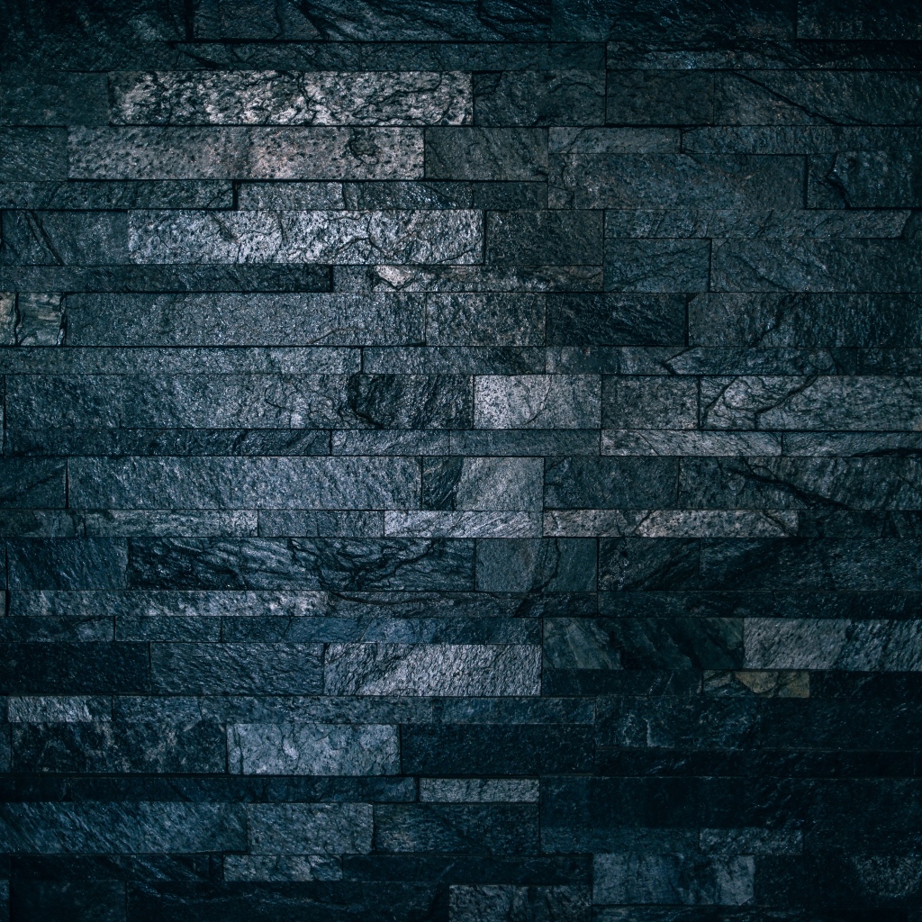 Черная гранитная стена крупным планом 