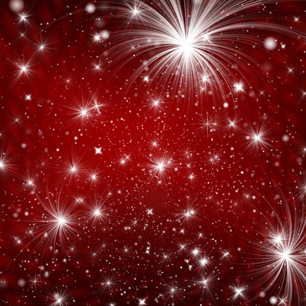 Яркие белые искры на красном фоне 
