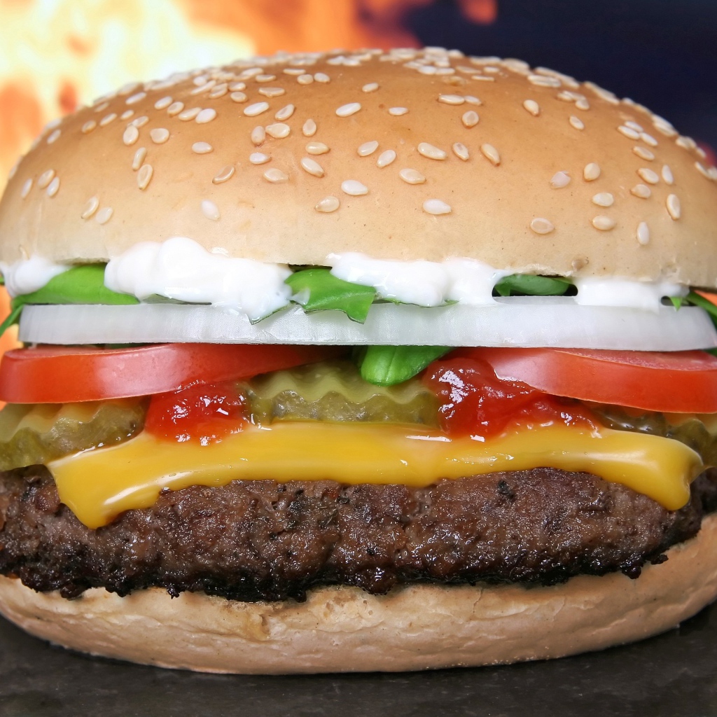 Big juicy burger with cheese