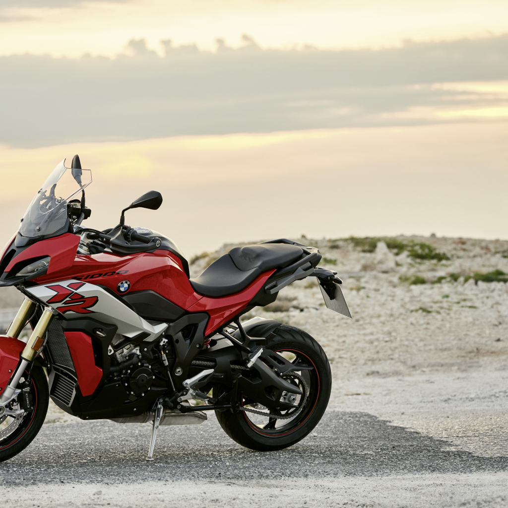 Red motorcycle BMW S 1000 XR at sunset