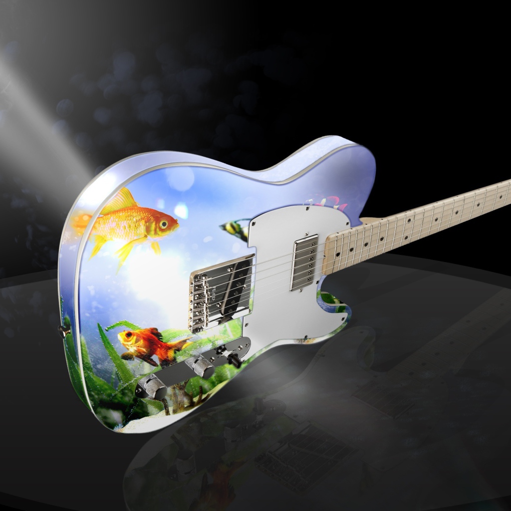 Гитара с рисунком в свете софитов