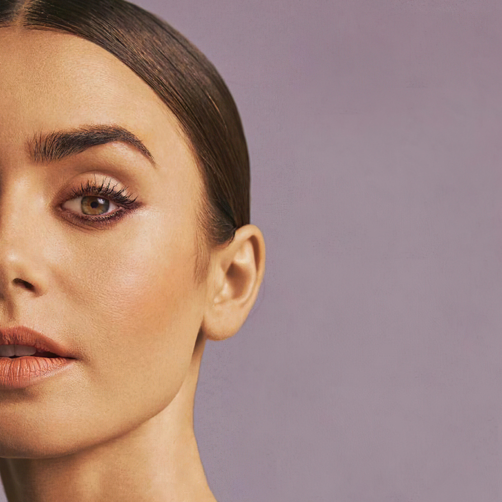 Актриса Лили Коллинз на розовом фоне крупным планом