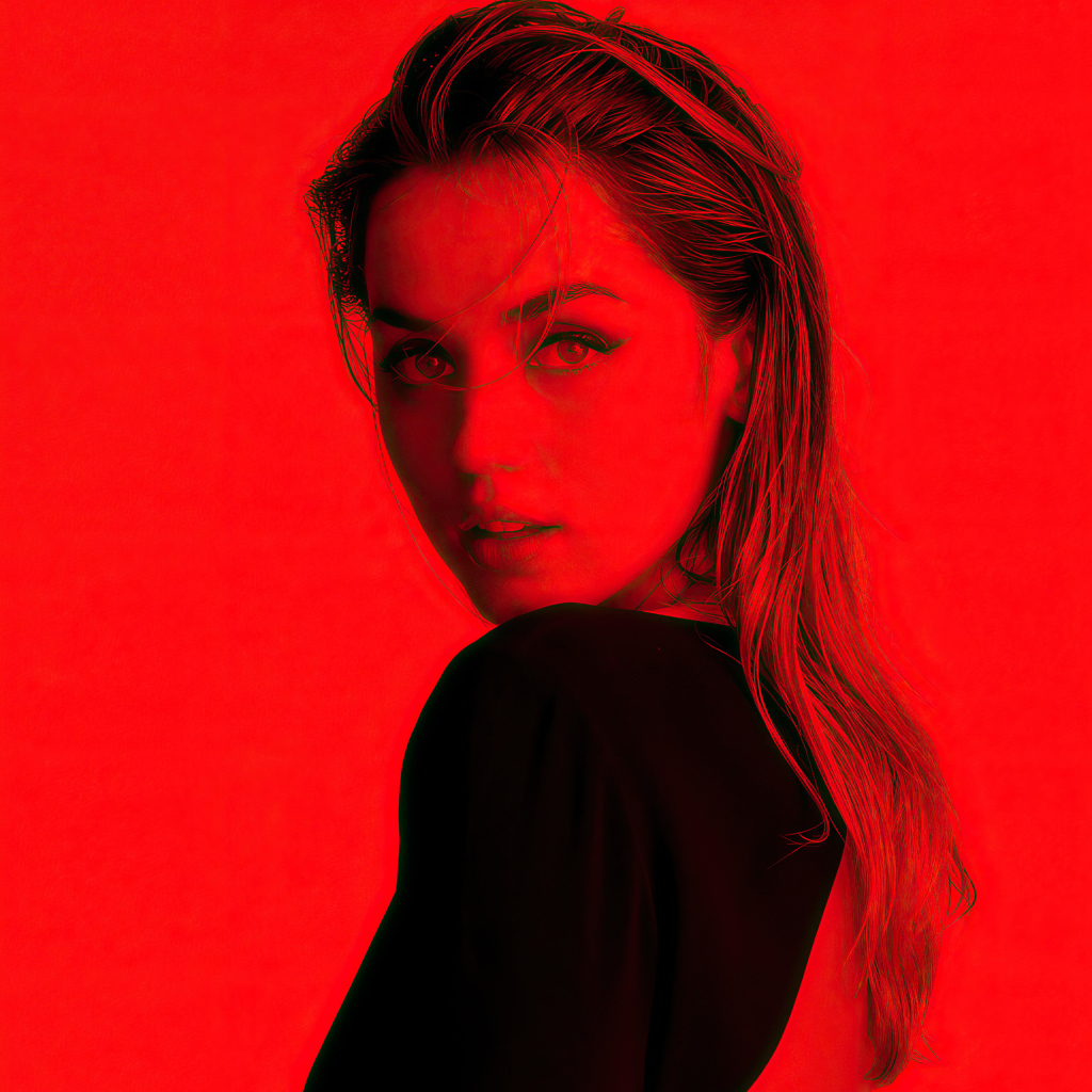 Испанская актриса Ана де Армас на красном фоне